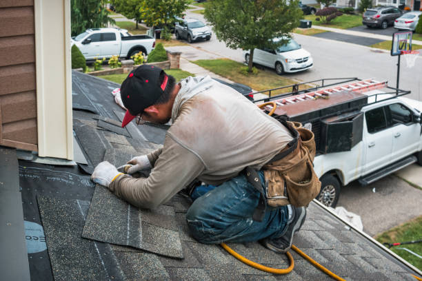 Professional Gutter Repair And Installation technician working in Hampton, CT